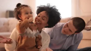 a couple holding a baby dealing with emergency custody